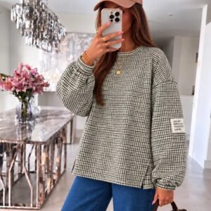 trui oversized met kleine ruitjes en patch